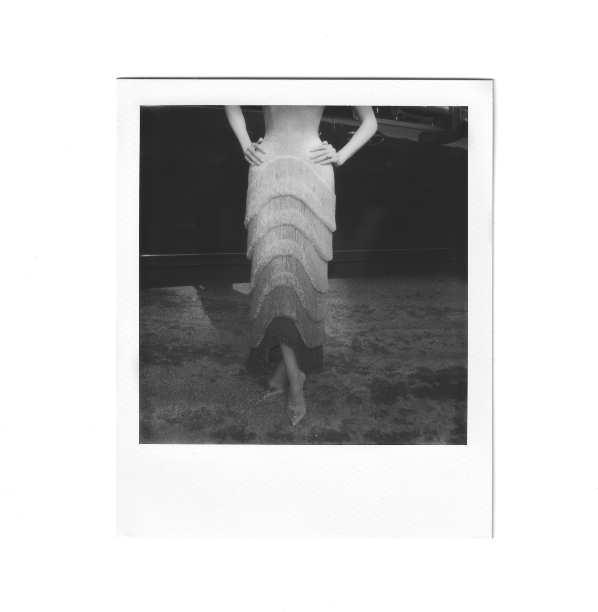 Robe à franges photographiée au Polaroid
